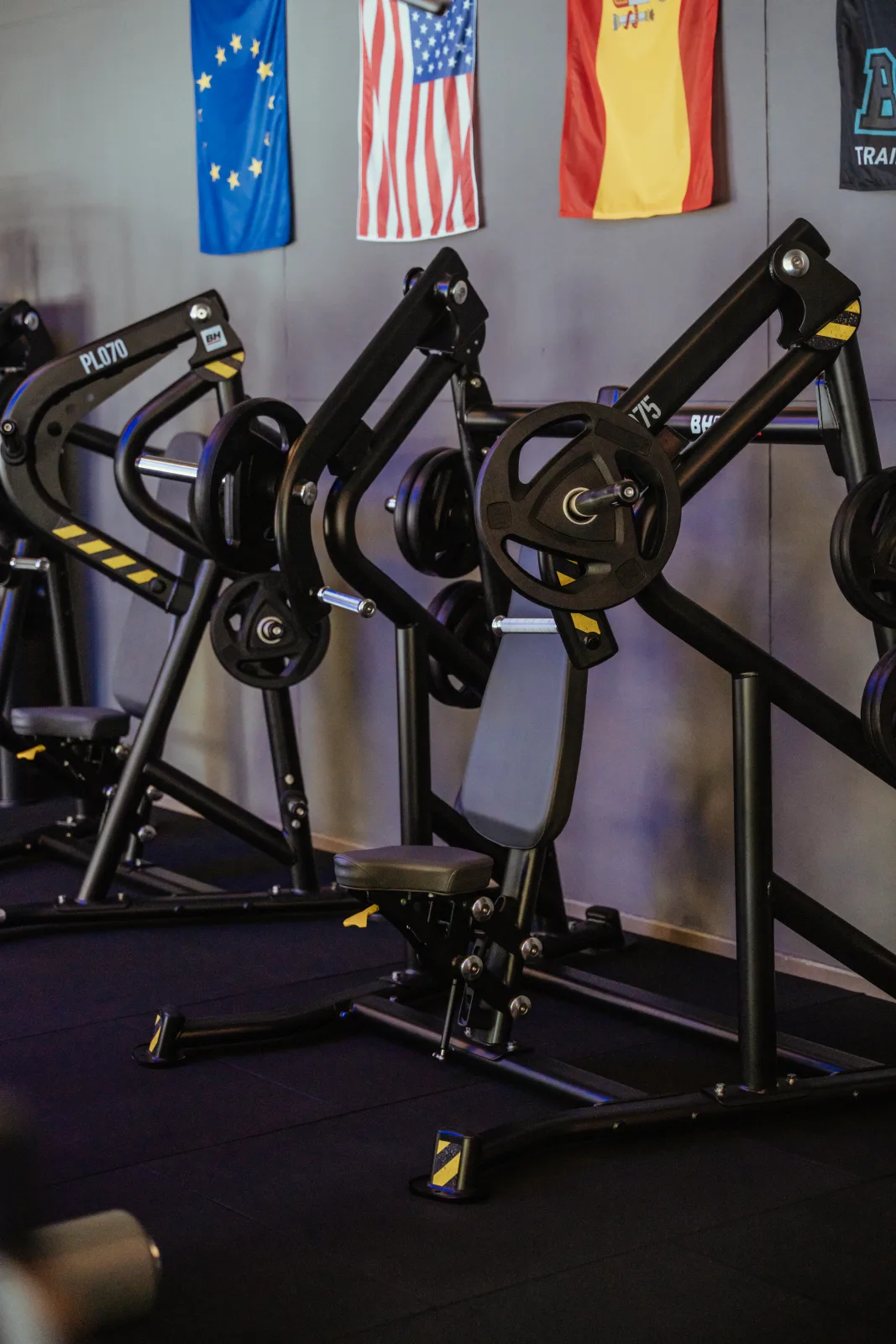 Plate-loaded shoulder and chest machines on the BEAST strength floor